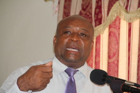 Minister of Social Development and Youth in the Nevis Island Administration Hon. Hensley Daniel addressing participants at the closing ceremony of the 8th annual Summer Job Attachment Programme at the Red Cross Building