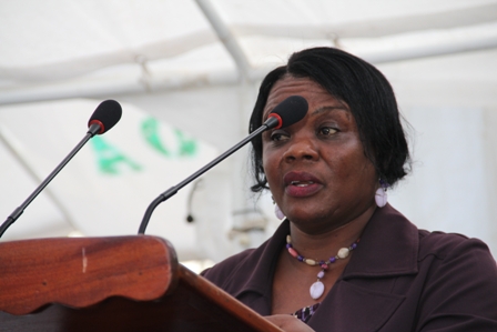 Project Manager of the Basic Needs Trust Fund on Nevis Mrs. Myrthlyn Parry giving an overview of the Barnes Ghaut Adult Education Centre before the new facility was handed over to the Nevis Island Administration on Wednesday