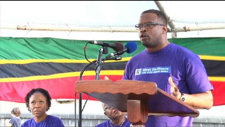 Deputy Premier of Nevis and Minister responsible for Social Services in the Nevis Island Administration Hon. Mark Brantley delivering a spirited address at the Child Abuse and Gender-Based Violence Rally at the Memorial Square in Charlestown on April 17, 2013