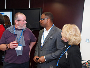Deputy Premier of Nevis and Minister of Tourism Hon. Mark Brantley speak with patrons at The Telegraph’s exclusive rum tasting event in London on October 03, 2014