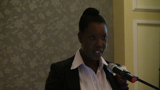 Regulator Heidi-Lynn Sutton delivering welcome remarks at the Nevis Financial Services Regulation and Supervision Department 2015 Anti-Money Laundering (AML) and Countering Financing of Terrorism (CFT) Awareness Seminar and Training Workshop on March 3 and 4, 2015 at the Four Seasons Resort Conference Room.