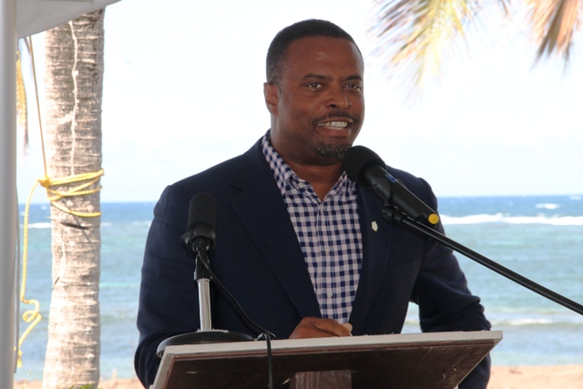 Deputy Premier of Nevis and Minister of Tourism Hon. Mark Brantley delivering remarks at the ground breaking ceremony of the HTRIP Candy Resort Villa Development at Liburd Hill on Nevis on April 17, 2015