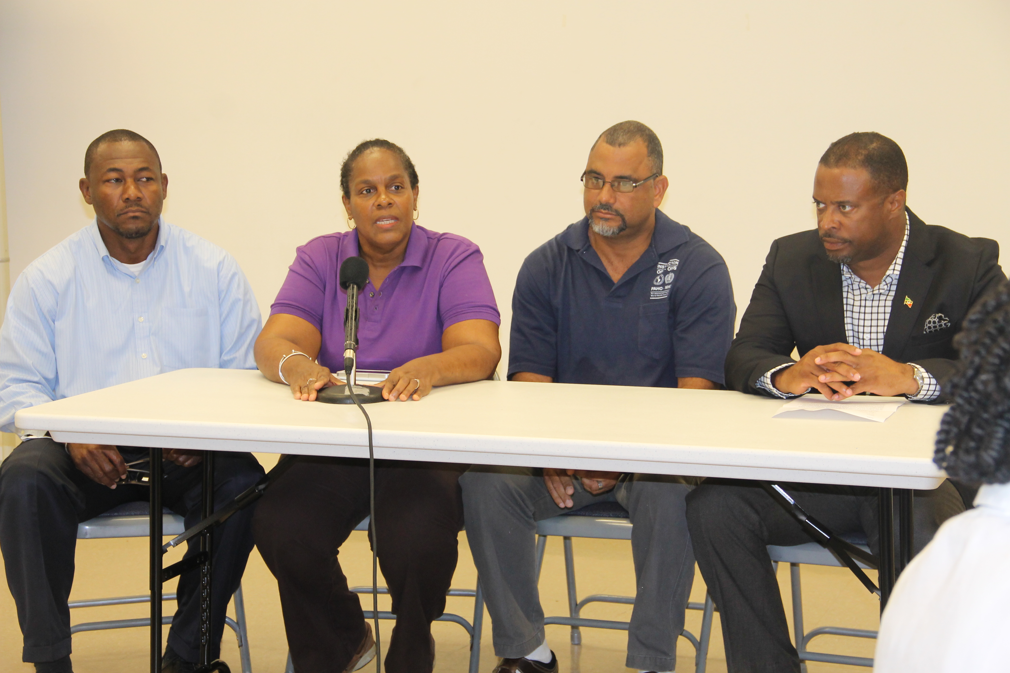 (L-R) Project Officer of the Nevis Disaster Management Department Brian Dyer, Medical Officer of Health Dr. Judy Nisbett, PAHO Representative and Workshop Facilitator Peter Burgees and Minister of Health Hon Mark Brantley at the Opening Ceremony of the PAHO Mass Casualty Management Workshop on May 26, 2015, at the Llewellyn Newton Disaster Management Facility, Long Point