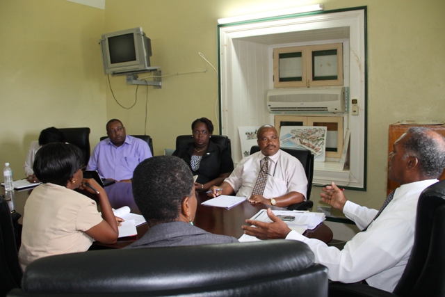 A meeting in session with Premier of Nevis Hon. Vance Amory (head of the table), other Nevis Island Administration officials and executive members of the Nevis Teachers’ Union and the St. Kitts Teachers’ Union at the Nevis Island Administration’s conference room at Bath Hotel on November 11, 2015