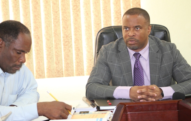 Hon. Mark Brantley, Premier of Nevis (right) and Minister of Finance and Mr. Colin Dore, Permanent Secretary in the Ministry of Finance at the start of a three-day Budget Estimates meeting on January 09, 2018 at the Ministry of Finance conference room