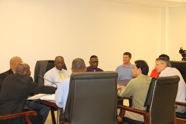 (l-r) Hon. Alexis Jeffers, Deputy Premier of Nevis; (partly hidden) Hon. Spencer Brand, Minister of Planning; Dr. Everson Hull, St. Kitts and Nevis Ambassador to the Organization of American States; Mr. Antonio Maynard, Secretary General of the St. Kitts and Nevis Commission for UNESCO; Mr. Christian Goodwillie; (hidden) Mrs. Evelyn Henville, Chairman of the Nevis World Heritage Committee; Mr. Herman Van Hooff; Mr. Daniel Young engaged in discussions regarding the inscription of Charlestown as a UNESCO World Heritage Site at the NIA’s conference room on January 31, 2018