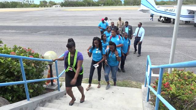 Premier of Nevis and Minister of Education Hon. Mark Brantley, Junior Minister of Education Hon. Troy Liburd, Permanent Secretary in the Ministry of Education Mr. Kevin Barrett and President of the Nevis Island Assembly Hon. Farrel Smithen welcome Team Nevis, winners of the 46th Leeward Islands Debating Competition on their arrival at the Vance W. Amory International Airport on March 05, 2018