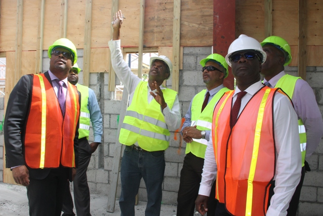 (middle) Mr. Collin Walters, Architect and Project Manager of the Treasury Reconstruction Project pointing out aspects of the project to members of the Nevis Island Administration Cabinet (to his left) Hon. Mark Brantley, Premier of Nevis; and, Hon. Troy Liburd (to the right) Hon. Spencer Brand, Mr. Stedmond Tross, Cabinet Secretary and Hon. Alexis Jeffers, Deputy Premier on a tour of the Treasury Reconstruction Project in Charlestown on March 07, 2018