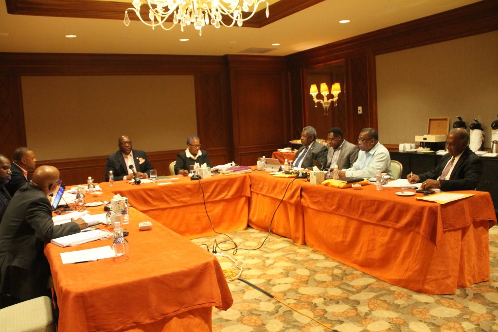 (l-r) (facing front) Hon. Lindsay Grant; (side profile) Hon. Shawn Richards; (side profile) Hon. Mark Brantley, Premier of Nevis; Hon. Timothy Harris, Prime Minister of St. Kitts and Nevis; Ms. Josephine Huggins; Vincent Byron, Attorney General; Hon. Eugene Hamilton; Hon. Ian Liburd; Hon. Vance Amory