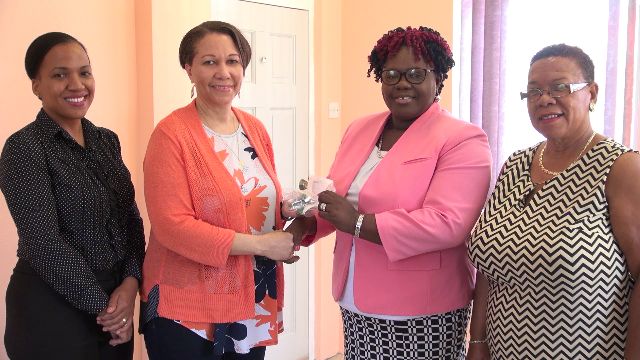 (l-r middle) Mrs. Coleen June Howell-Emanuel hands over gift of assorted breathing masks to Junior Minister of Health Hon. Hazel Brandy-Williams at her office in Charlestown on June 05, 2018. Looking on are Mrs. Nichole Slack-Liburd, Permanent Secretary in the Ministry of Health (extreme left) and Ms. Tessa Howell (extreme right)