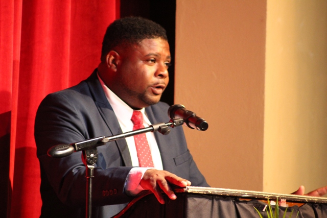 Hon. Troy Liburd, Junior Minister of Education on Nevis delivering remarks at the opening ceremony of the Department of Education’s annual Back to School 2018 exercise at the Nevis Performing Arts Centre on August 27, 2018