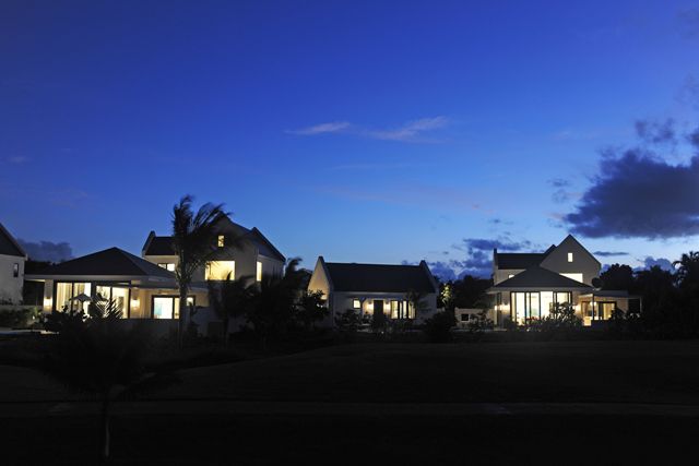 Some Four Seasons Resort Estates Villas at Pinney’s Beach at dusk on Nevis (photo courtesy FSRE)