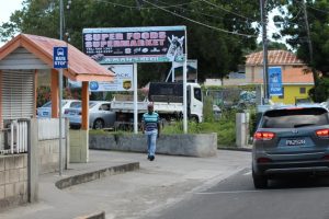 An official Traffic Department bus stop erected on the Island Main Road for buses heading away from Charlestown towards Gingerland