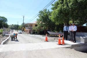 Section two of the first phase of the Brown Hill Road Rehabilitation Project is ready for asphalting with workers conducting finishing touches to the curb on October 31, 2018