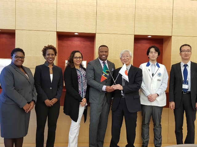 (Fourth from left) Hon. Mark Brantley, Minister of Foreign Affairs and Aviation with (third from right) Mr. Shoichiro Katayama, Executive Director of the National Museum of Emerging Science and Innovation (Miraikan) ‘Future House’ in Japan on November 02, 2018. Looking on are (l-r) Ms. Shanelle Simmonds, Foreign Service Officer; Her Excellency Jasmine Huggins, St. Kitts and Nevis Resident Ambassador to the Republic of China (Taiwan); and Mrs. Sharon Brantley, wife of Mr. Brantley and (on the extreme right) other staff at the museum