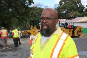 Mr. Daniel Williams, Supervisor of Roads at the Public Works Department on Nevis directing road works at Bath Village on February 13, 2019