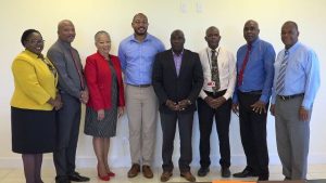 Junior Minister Hon. Hazel Brandy-Williams; Hon. Spencer Brand; Mrs.Hélène Anne Lewis Legal Advisor to the NIA; Mr. Jonel Powell, Managing Director and Legal Counsel of B&L Worldwide Ltd.; deputy Premier of Nevis Hon. Alexis Jeffers; Mr. Oral Brandy, Manager of the Nevis Air and Sea Port Authority; Mr. Stedmon Tross, Cabinet Secretary and Hon. Eric Evelyn at the signing ceremony On February 06, 2019, for a Concession Agreement Regarding the Development of the Vance W. Amory International Airport by and between the Nevis Island Administration, Nevis Air and Sea Port Authority and B&L Worldwide Ltd. in Cabinet Room at Pinney’s Estate 