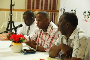 Hon. Eric Evelyn, Minister of Culture (middle) flanked by Mr. Keith Glasgow, Permanent Secretary in the Ministry of Culture and Mr. Abonati Liburd, Executive Director of the Culturama Secretariat while addressing participants in Charlestown at the last of three consultations held by the Ministry of Culture and the Culturama Secretariat ahead of Culturama 