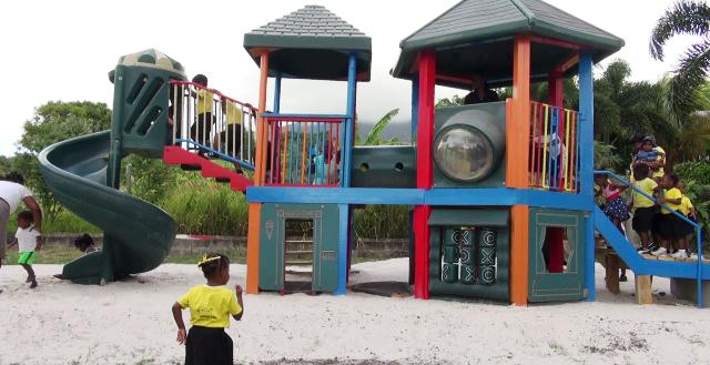 Students of Naomi’s Nursery and Pre School in Garricks Pasture, Jessups Village enjoying a playground donated by the Four Seasons Resort, Nevis