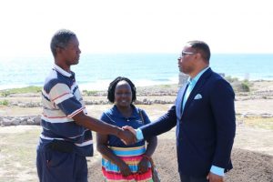 Mr. Keithley Amory, Coordinator of the Nevis Historical Conservation Society’s New River Coconut Walk Restoration Project, and Ms. Pauline Ngunjiri, Executive Director of the Nevis Historical and Conservation Society, welcomes Hon. Mark Brantley, Premier of Nevis, to Coconut Walk on April 23, 2019