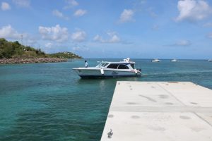 One of the vessels in the Islander Watersports fleet coming to dock at the new water taxi pier at Oualie Bay on May 20, 2019