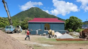 The main building of the Gingerland Cultural Centre on September 10, 2019, on which construction of the roof of the performance area is expected to commence soon 