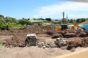 Ongoing work on the vendor’s booths to the left of the main building on September 10, 2019, with the area earmarked for parking at the far end of the property 
