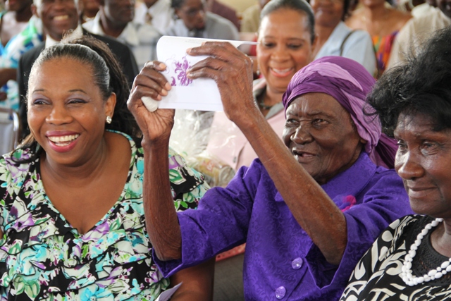 A lively Ms. Celian “Martin” Powell celebrating her 100th birthday with family, friends and well-wishers at the Zion Methodist Church on January 19, 2012 (file photo)