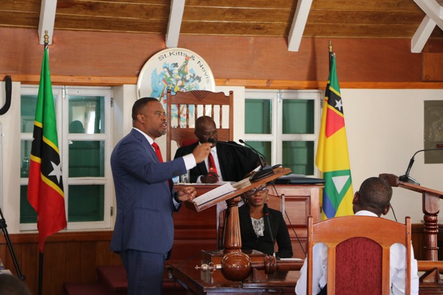 Hon. Mark Brantley, Premier of Nevis and Minister of Finance in the Nevis Island Administration, makes his presentation at a sitting of the Nevis Island Assembly before Hon. Farrel Smithen, President of the Nevis Island Assembly and Ms. Myra Williams, Clerk on November 19, 2019