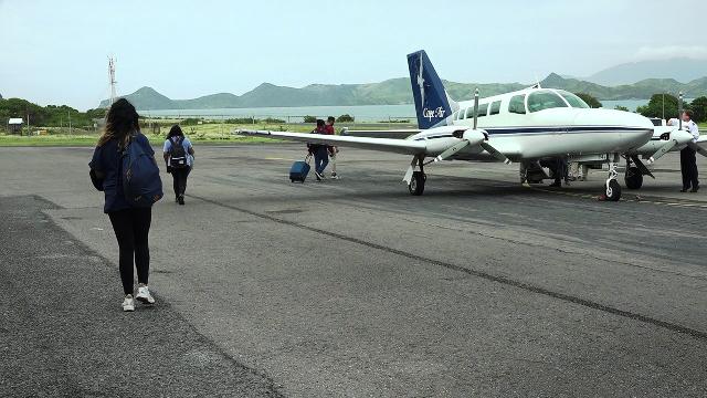 Passengers boarding Cape Air’s first flight from the Vance W. International Airport on December 12, 2019