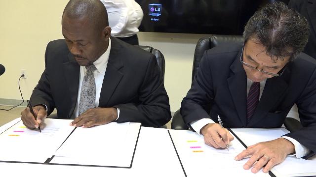 (L-r) Mr. Brian Dyer, Director of the Nevis Disaster Management Department signs Memorandum of Understanding with His Excellency Tatsua Hirayama, Japan Ambassador to St. Kitts and Nevis at the Nevis Disaster Management Department’s conference room at Long Point on December 17, 2019, for the Japan Grant Aid Project for Improving Disaster Resilience in Nevis