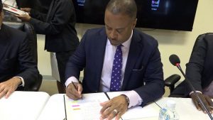 Hon. Mark Brantley, Premier of Nevis signs the Memorandum of Understanding with His Excellency Tatsua Hirayama, Japan Ambassador to St. Kitts and Nevis on behalf of the Nevis Island Administration at the Nevis Disaster Management Department’s conference room at Long Point on December 17, 2019, for the Japan Grant Aid Project for Improving Disaster Resilience in Nevis