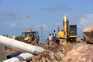 Workers from the Nevis Water Department involved in trenching work on site at the Hamilton Reservoir on February 19, 2020