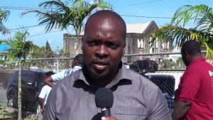 Students of the Maude Crosse Preparatory School learning to tend to newly planted fruit treed under the watchful eye of an officer from the Department of Agriculture following a tree planting exercise on the school grounds on March 13, 2020
