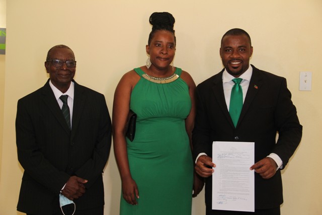 Mr. Bjorn Hanley (r) of the Nevis Reformation Party moments after he was nominated on May 27, 2020, at the David Freeman Centre of Excellence by Mr. Myron C. Liburd of Rices Village and Ms. Shakiela Morton of Hanley’s Road to contest the general elections in Constituency No.10 on June 07, 2020