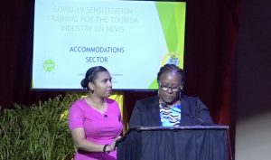 (L-r)Assistant Nurse Manager Chandreka Wallace; and Assistant Matron Jessica Scarborough from the Alexandra Hospital making a presentation on “Health and Safety Protocols” at the first COVID-19 sensitization training session, hosted by the Ministry of Tourism in collaboration with the Nevis Tourism Authority and the Ministry of Health, on July 27, 2020 at the Nevis Performing Arts Centre