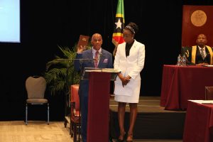 Hon. Eric Evelyn, Member for Nevis 10 in the National Assembly, taking the Oath of Allegiance at the Opening of the National Assembly at the St. Kitts Marriott Resort on July 08, 2020, while Mrs. Sonia Boddie-Thompson, Clerk of the National Assembly looks on