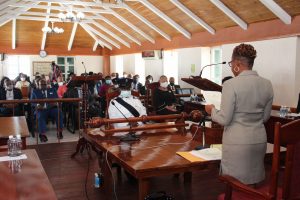 Ms. Myra Williams, Clerk of the Nevis Island Assembly reading a message from the Governor General of St. Kitts and Nevis His Excellency Sir Tapley Seaton at the special sitting of the Nevis Island Assembly on July 31, 2020, to commemorate the 50th Anniversary of the MV Christena Disaster