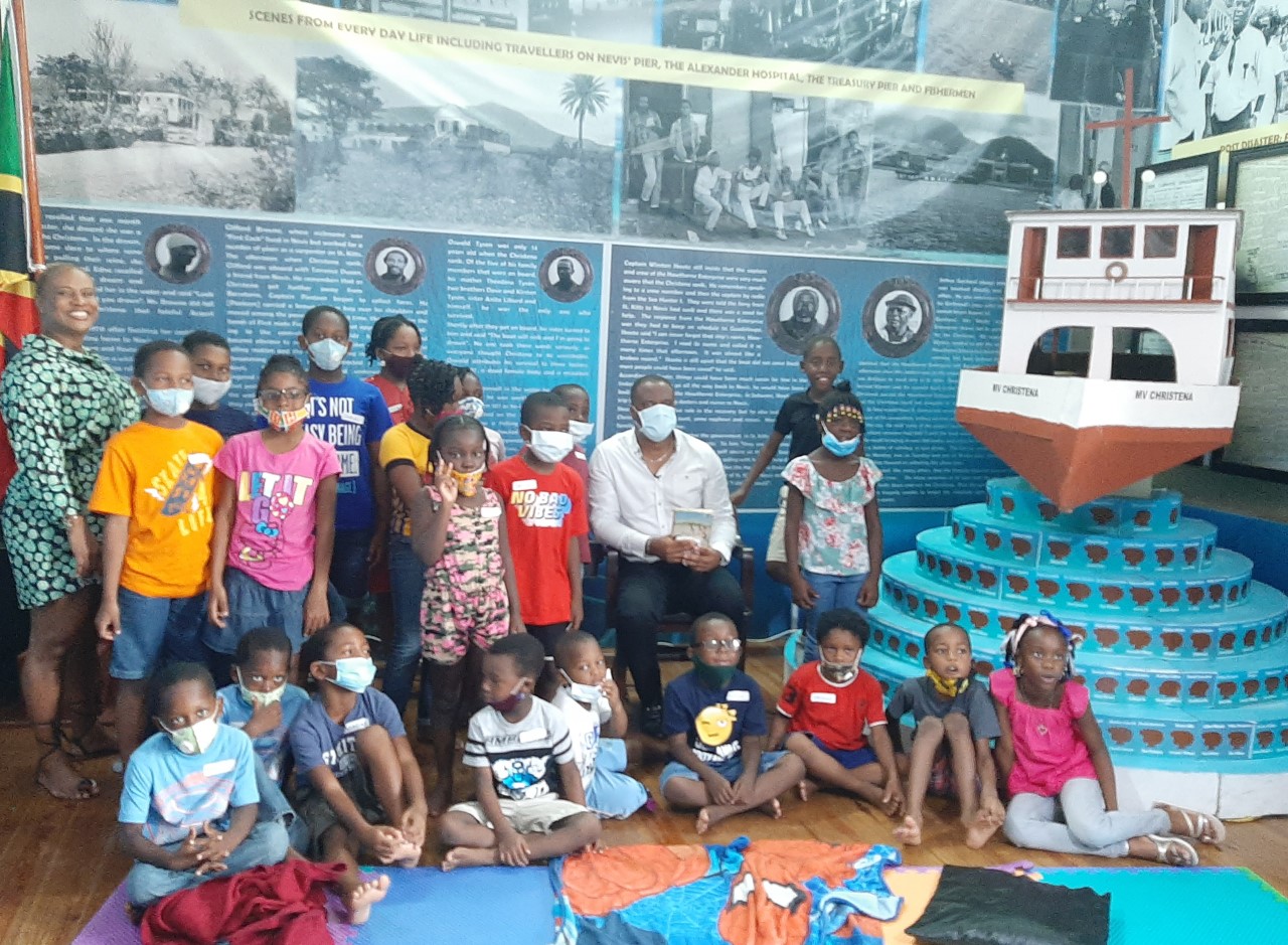 Hon. Mark Brantley, Premier of Nevis, with Ryllis Percival, Executive Director of the St. Christopher National Trust and National Museum (far left), and attendees at the Heritage House Storytelling Series on August 08, 2020