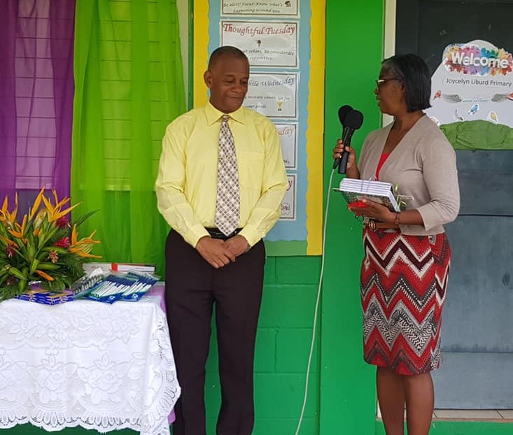 (l-r) St. George’s Parish Representative Hon. Eric Evelyn, Minister of Youth and Community Development in the Nevis Island Administration and Ms. Barbara Hendrickson, principal of the Joycelyn Liburd Primary School in Gingerland during a ceremony for the donation of school supplies to the students on September 24, 2020