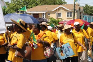 Older persons on Nevis marching through Charlestown in observance of International Month of Older Persons hosted by the Social Services Department in the Ministry of Social Development (file photo)