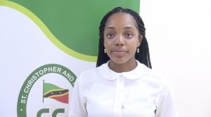 Ms. Zwena Jones of Zee’s Exquisite Apparel Line (ZEAL), a budding entrepreneur, recipient of a St. Christopher and Nevis Social Security Board Scholarship and a student of the Nevis Sixth Form College at the Social Security’s Board Room at Pinney’s Estate on September 25, 2020, after donating fabric masks from her apparel line to staff at the Nevis Social Security Board, Nevis Branch to assist in their fight against COVID-19