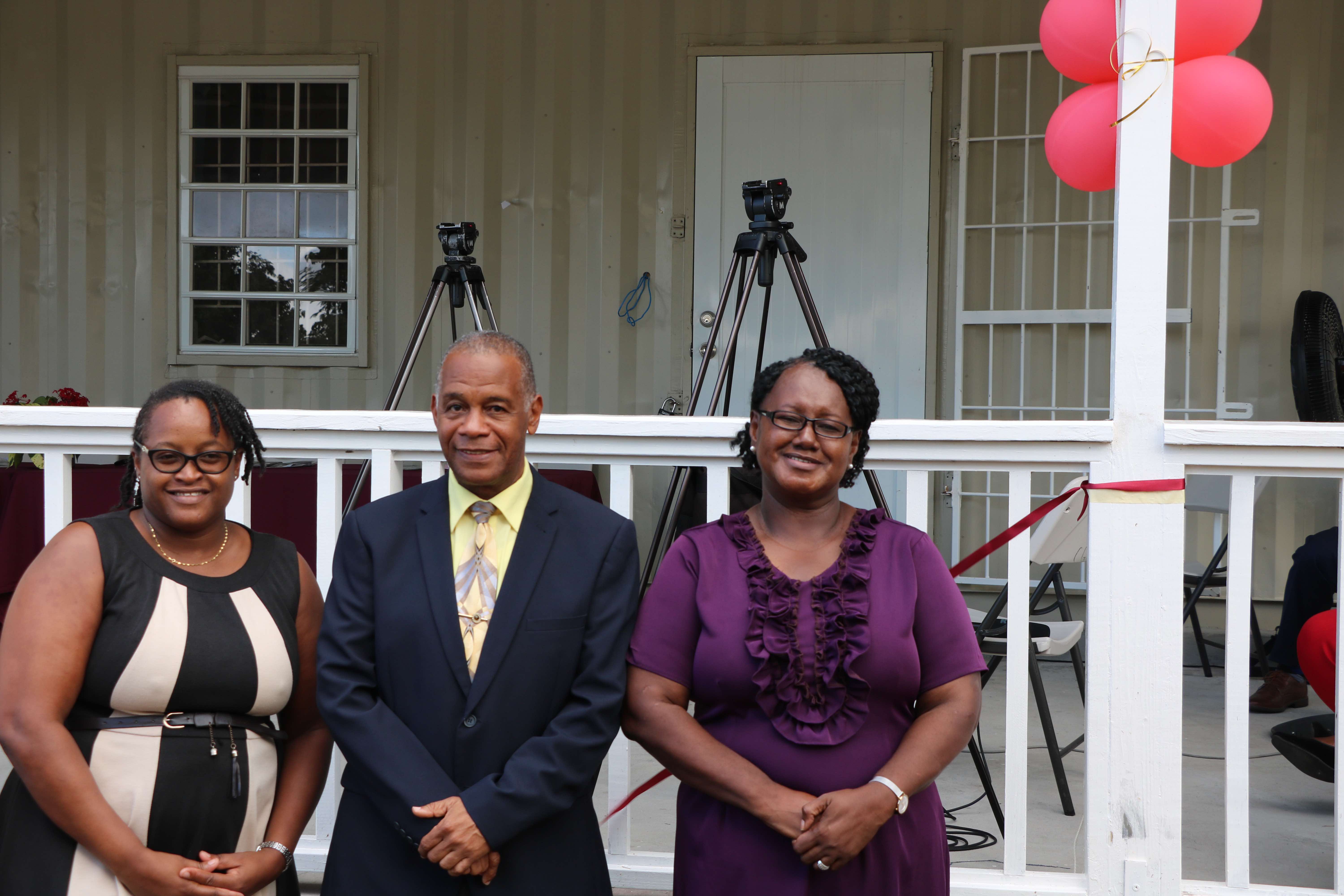 Ms. Azilla Clarke, focal point for OECS/USAID Juvenile Justice Reform Project in St. Kitts and Nevis, Hon. Eric Evelyn, Minister and Social Development in the Nevis Island Administration, and Ms. Sandra Maynard, Director of the Department of Social Services on Nevis at the October 27, 2020 opening of the "Yes To Success" skills training and diversion site at Pinney's Estate, Nevis