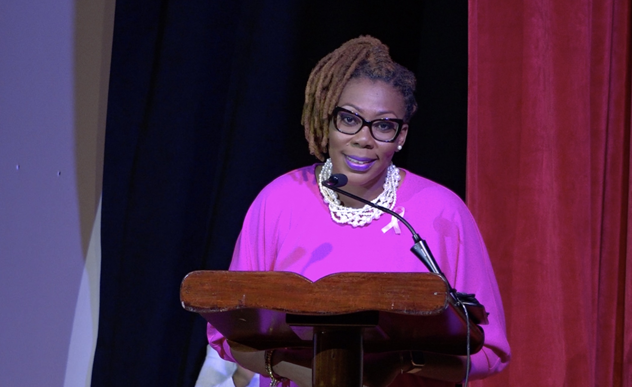 Ms. Camara Lee, a breast cancer survivor from Nevis, making her presentation as the featured speaker at the Ministry of Health’s Breast Cancer Awareness Forum at the Nevis Performing Arts Centre on October 21, 2020
