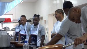 Chef Michael Henville (third from right) facilitates the first session of the “Men Can Cook” programme hosted by the Ministry of Health and Gender Affairs in the Nevis Island Administration at the Charlestown Primary School on November 16, 2020