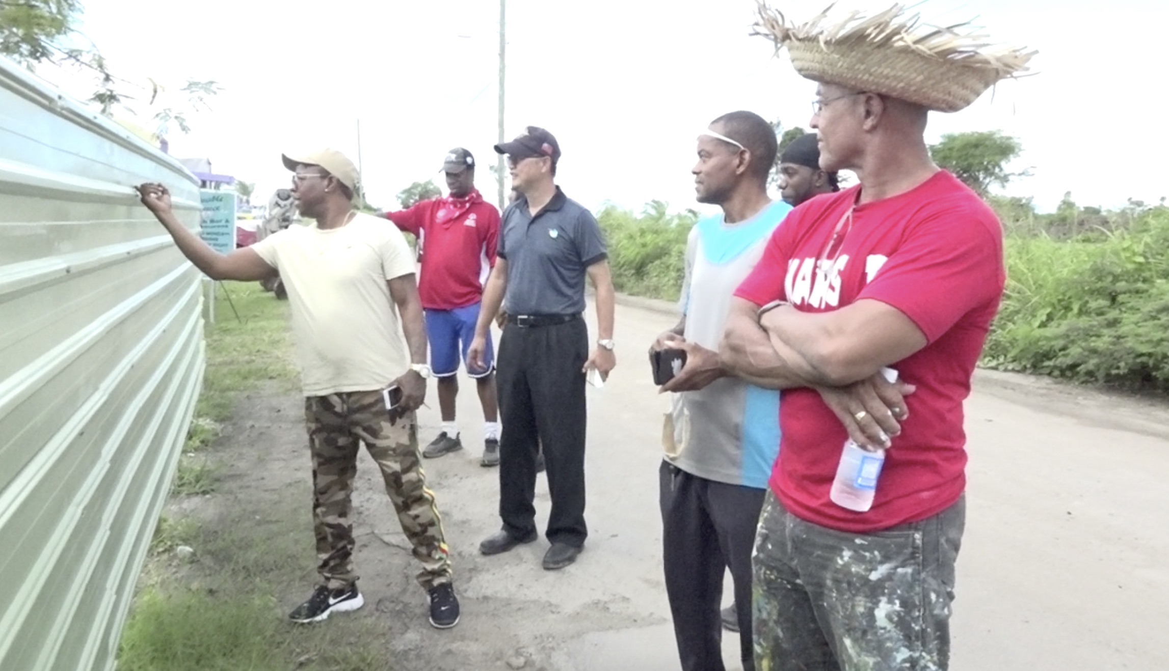 Nevisian artists plan for the painting of cultural artwork on the perimeter fence of the Pinney’s Recreational Park site at Pinney’s Beach on Nevis