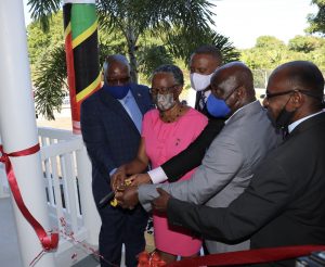 Hon. Dr. Timothy Harris, Prime Minister of St. Kitts and Nevis and Minister of National Security; Her Honour Mrs. Hyleeta Liburd, Deputy Governor-General; Hon. Mark Brantley, Premier of Nevis and Minister of Finance in the Nevis Island Administration; Hon. Alexis Jeffers, Deputy Premier and area representative for St. James’ Parish; and Pastor Frankie Griffin of the Apostolic Reformation Centre cutting the ribbon to commission the new multimillion-dollar New Castle Police Station and Fire Unit on December 03, 2020