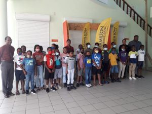 Participants at the Ministry of Education’s three-day Kite Making Workshop for public primary schools with officials and sponsor representative at the opening ceremony at the Elizabeth Pemberton Primary School on March 29, 2021