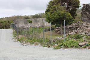 Another section of the new fence installed by the Ministry of Tourism at the New River Heritage Site in Gingerland