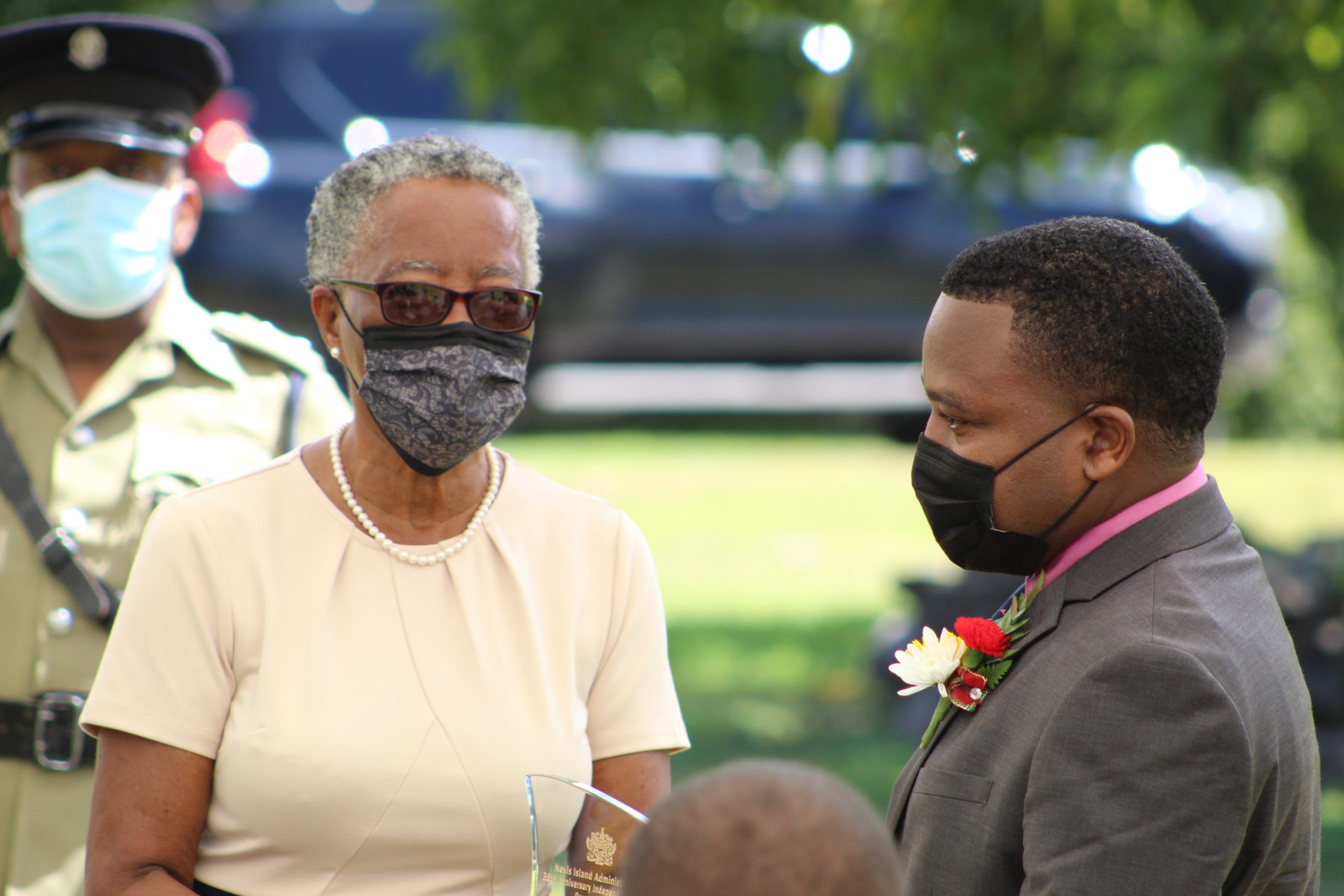 Her Honour Mrs. Hyleeta Liburd, Deputy Governor General of Nevis, presenting a plaque to Mr. Troy McKoy at an awards ceremony at Government House on September 20, 2021, for his contribution to Business on Nevis on the occasion of the 38th Anniversary of Independence of St. Christopher and Nevis